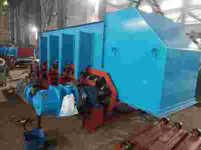 板式喂料机在生料立磨喂料装置的技改图1